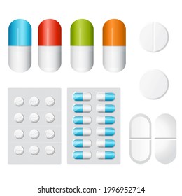 Set of realistic medical white and color pills on isolated background. Capsule, round tablet, oval tablet, tablets in a package. View from above. Flat lay. Medical and healthcare concept. 