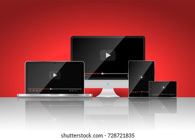 Set of realistic modern digital devices with reflections on red background. Video player template. Vector illustration