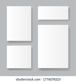 Set of realistic paper sheets on grey background with soft shadows. White booklet template. Business card design or flyer mock-up. Vector illustration.