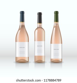 Set of realistic rose wine bottles on white background. Different sorts of wine bottles. Vector illustration.