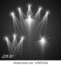 Set of realistic vector bright projectors for scene lighting isolated on plaid background. Special light effects collection
