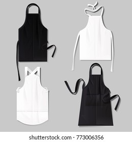 Set of realistic white and black aprons vector illustration