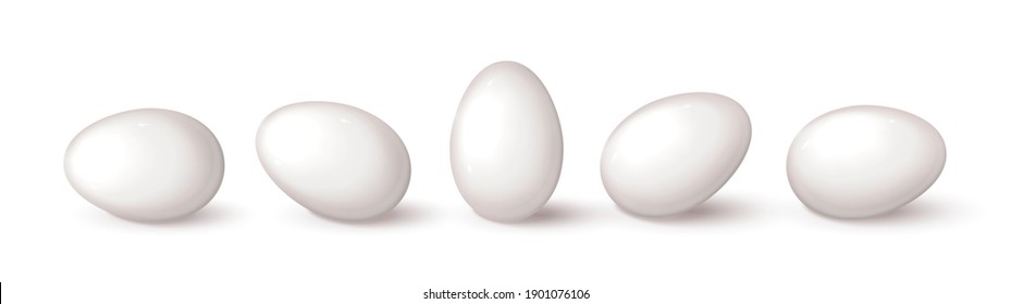 Set of realistic white eggs on white background. Realistic eggs in different positions. Vector illustration with 3d decorative objects for Easter design.