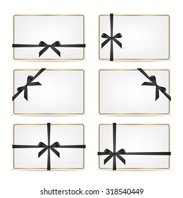 Set of realistic white gift cards with black ribbons and gold frame. Vector EPS10 illustration. 