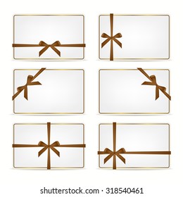 Set of realistic white gift cards with brown ribbons and gold frame. Vector EPS10 illustration. 