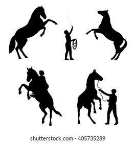 Set of rearing horses. Silhouettes isolated.