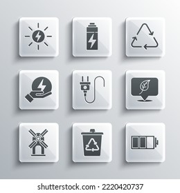 Set Recycle bin with recycle, Battery, Location leaf, Electric plug, Wind turbine, Lightning bolt, Solar energy panel and symbol icon. Vector