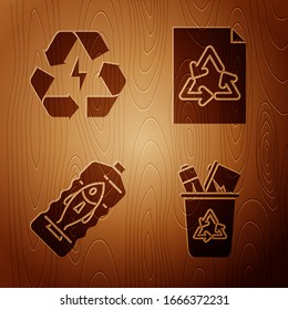 Set Recycle bin with recycle symbol, Battery with recycle symbol, Stop ocean plastic pollution and Paper with recycle on wooden background. Vector
