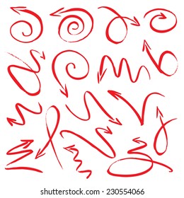 A set of red arrows drawn with a brush. Useful graphic elements for presentations. Isolated Vector Graphics.