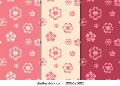 Set of red floral ornaments. Cherry pink vertical seamless patterns. Wallpaper backgrounds
