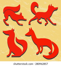 Set of red fox silhouettes. Grunge background. 