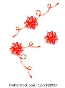Set of red gift bows with curly ribbons isolated on white background