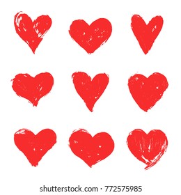 Set of red grunge hearts. Vector heart shapes.