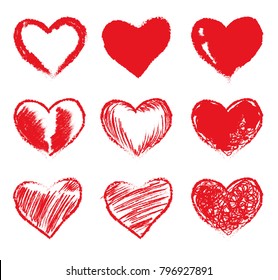 Set of red grunge hearts. Vector heart shapes