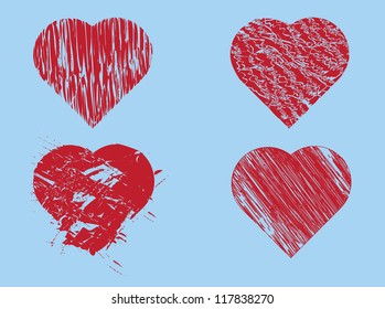 Set of red hand drawn hearts on blue background