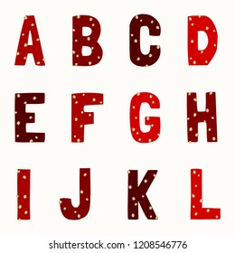 A set of red letters A-L decorated with golden dots. Festive typographic alphabet isolated on white background.