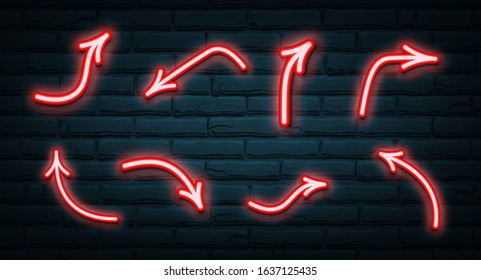 Set of red neon arrows glowing on dark brick wall background. Vector illustration.