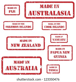 Set of red rubber stamps of Made In symbols for Australasia region, including Australia, New Zealand, Fiji, Cook Islands, Solomon Islands, Vanuatu, Tonga, Papua New Guinea