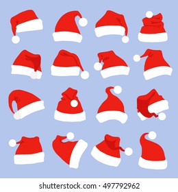 Set of red santa claus hats icon isolated on blue background