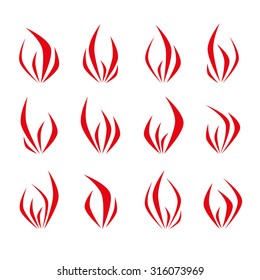 Set of red silhouettes of fire flame. Isolated design elements of different shapes for decoration.