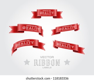 A set of red vector silky ribbon tags "Premium Quality Guaranteed"