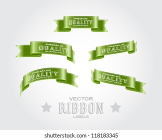 A set of red vector silky ribbon tags "Premium Quality Guaranteed"