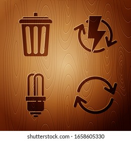 Set Refresh, Trash can, LED light bulb and Recharging on wooden background. Vector