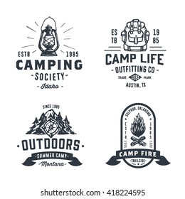 Set of Retro Camping Outdoor Badges, Old School Logos, Vintage Emblems and Design Elements. Hand drawn Vector Illustration of Backpack, Lantern, Campfire, Compass, Forest, Mountains, Firewood.