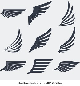 Set of retro inked modern wings icons and emblems for logos, coat of arms signs or other graphic or printing materials.