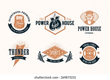 Set of retro styled fitness emblems. Vintage gym logo templates. Vector illustrations.