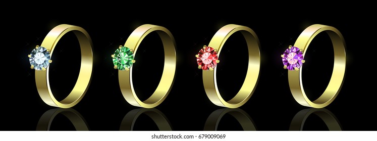 Set of rings with colored gems on black background