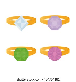 Set of rings with different jewels on a white background