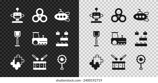 Set Robot toy, Fidget spinner, Submarine, Puzzle pieces, Drum with drum sticks, Rattle baby, Shovel and Toy train icon. Vector