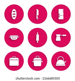 Set Rolling pin, Cooking pot, Kettle with handle, Coffee turk, Kitchen colander, Refrigerator and Bread loaf icon. Vector