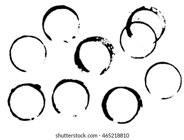 Set of round black circle ring grunge stains, monochrome wine or coffee, isolated on white background. Vector illustration.