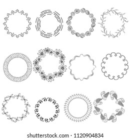 Set with Round Black Hand Drawn Frames on the White Background.Abstract and Floral Frames with Swirls, Waves, Copybook Spring, Flowers, Grapes and other. Design Elements for Print and Web Usage