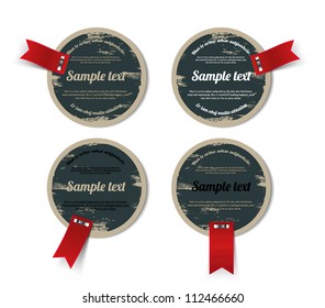 A set of round blue vector vintage military style badges with grunge weathered paint background and metallic staples, decorated with red ribbons