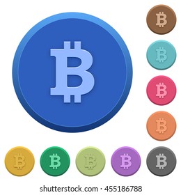 Set of round color embossed bitcoin sign buttons