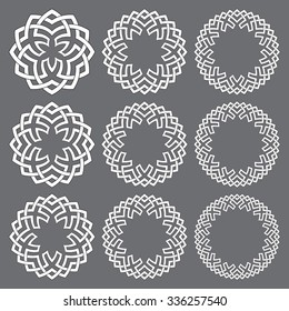 Set of round frames. Nine circle decorative elements for logo design with stripes braiding borders. White lines with black strokes on gray background.