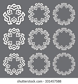 Set of round frames. Nine decorative elements for logo design with stripes braiding borders. White lines with black strokes on gray background.