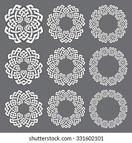 Set of round frames. Nine decorative elements for logo design with stripes braiding borders. White lines with black strokes on gray background.