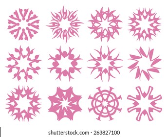 Set of round geometric abstract patterns inspired by snowflakes in winter season. Decorative vector design element in pink isolated  on white background.
