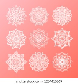 Set of round gradient mandala on living coral color of the year. Vector hipster white mandala on rose pink background. Mandala with floral patterns. Yoga template.