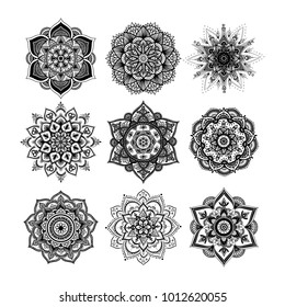 Set of round hand drawn mandala on white isolated background. Vector hipster mandala in monochrome. Mandala with floral patterns. Yoga template.