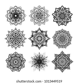 Set of round hand drawn mandala on white isolated background. Vector hipster mandala in monochrome. Mandala with floral patterns. Yoga template.