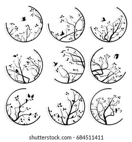 Set of round icons stylized tree branches and birds with its shadow.