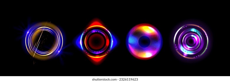 Set of round light flares isolated on black background. Vector realistic illustration of rainbow color circles with neon glow effect. Radial energy vortex, optical halo portal. Disco decor