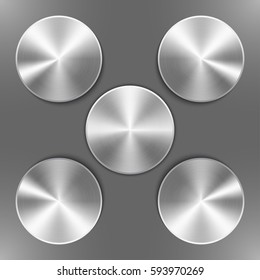 Set of round silver disks with brushed metal textures and different angles of reflection isolated on gray background