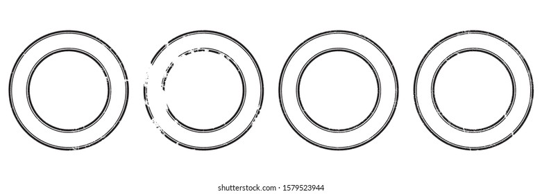 Set of round stamps in grunge style black on white background