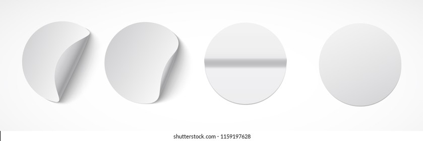 Set of round white sticky labels with bent edges. Empty mockup for memos, price tags, gluing.